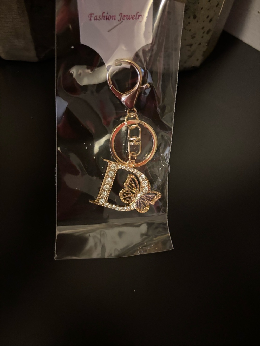 Gold Crystal Letter D Keychain with Butterfly Accent